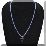 J044. 18K white gold cross on blue crystal beaded chain. 17” - $